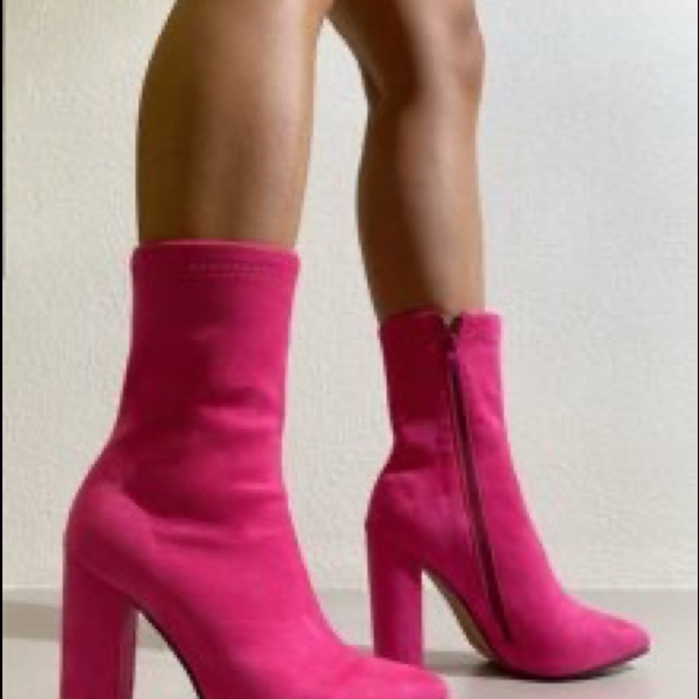 Pink booties, never worn.